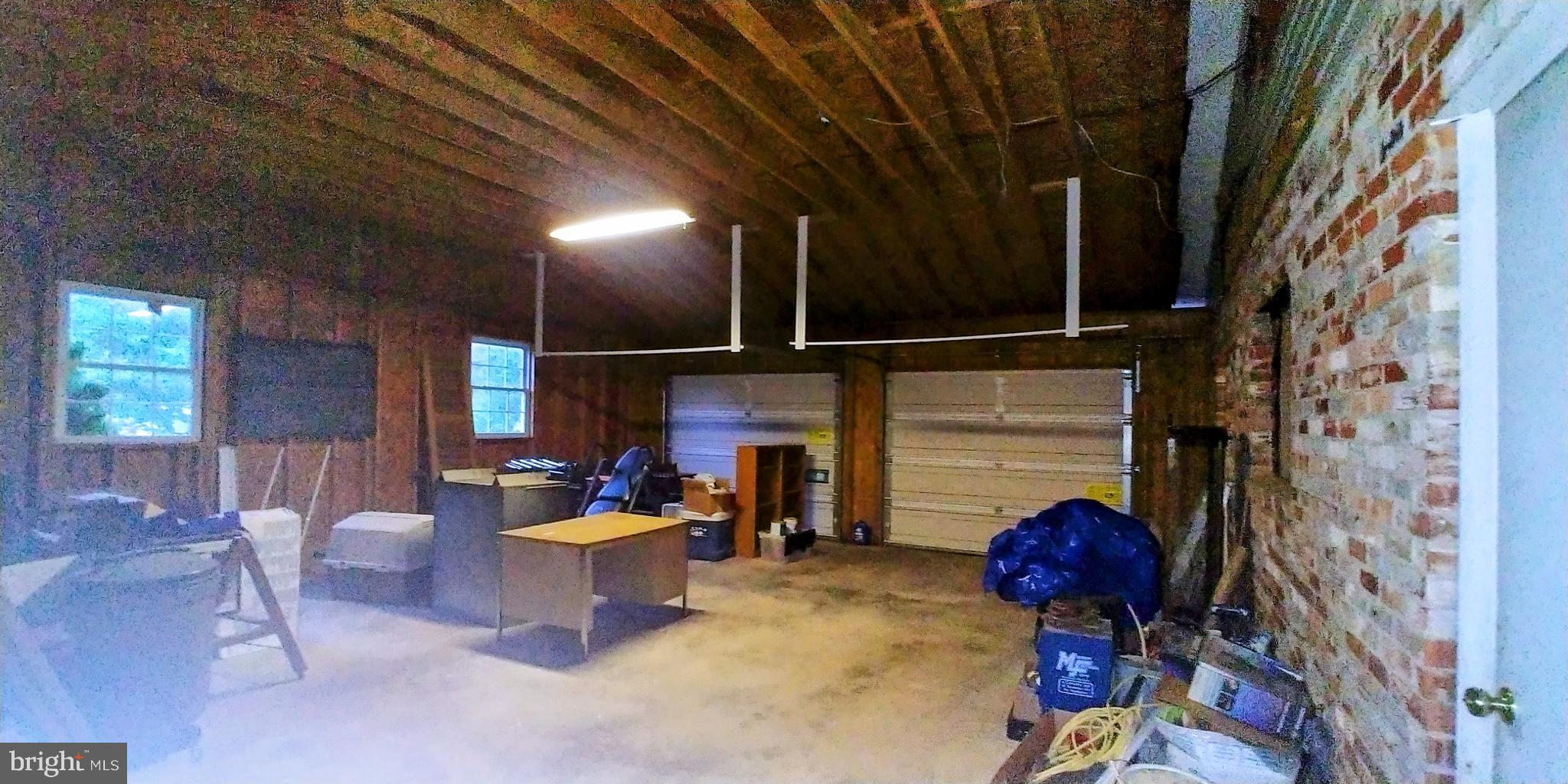 28484 Raccoon Ford Road Burr Hill, VA 22433 - Photo 44 of 48 Huge 23x32 garage, double doors, concrete floor