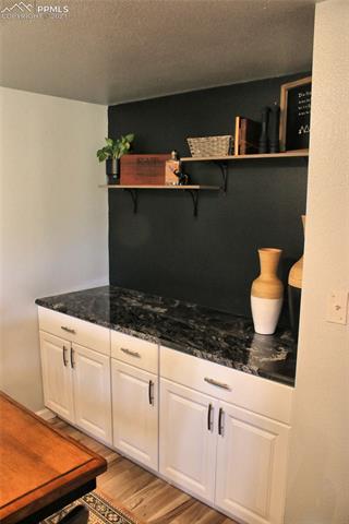 6095 West Condor Road Peyton, CO 80831 - Photo 7 of 33 Wonderful buffet with lots of storage.