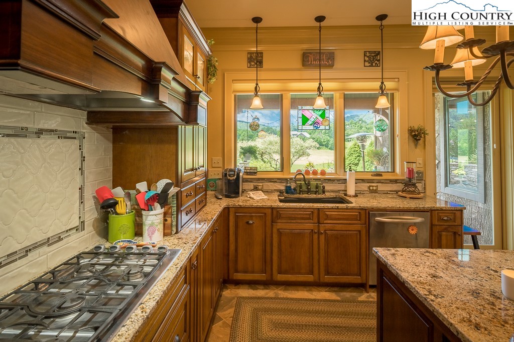 800 Turtle Creek Drive, Unit 4B Boone, NC 28607 - Photo 17 of 45 a kitchen with lots of counter top space and wooden floor