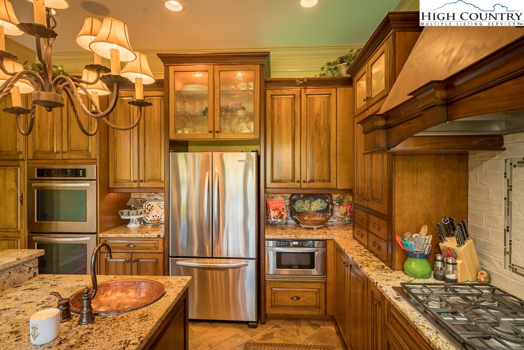 800 Turtle Creek Drive, Unit 4B Boone, NC 28607 - Photo 18 of 45 a kitchen with stainless steel appliances granite countertop a refrigerator and a stove