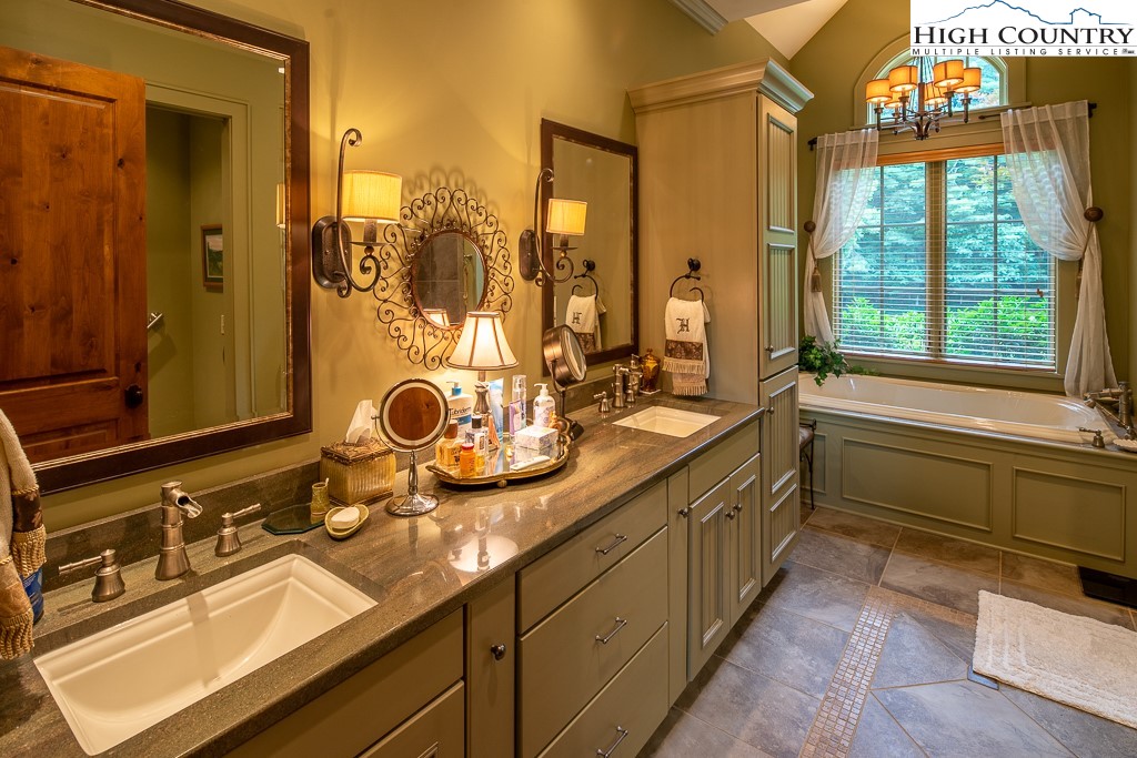 800 Turtle Creek Drive, Unit 4B Boone, NC 28607 - Photo 26 of 45 a bathroom with a sink and a mirror