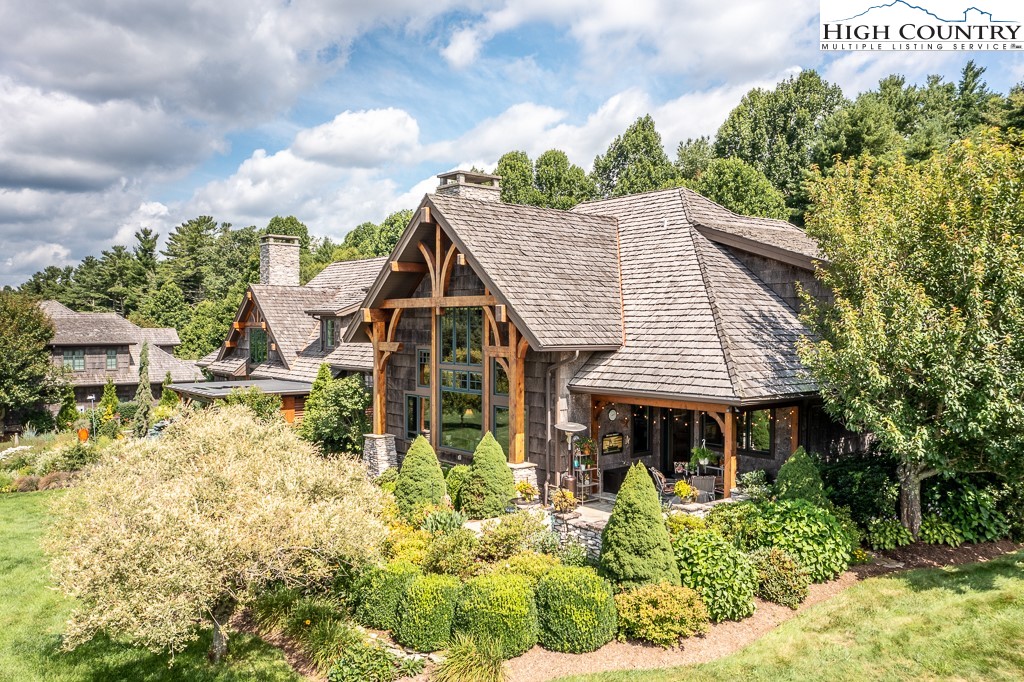 800 Turtle Creek Drive, Unit 4B Boone, NC 28607 - Photo 39 of 45 a aerial view of a house with table and chairs and potted plants