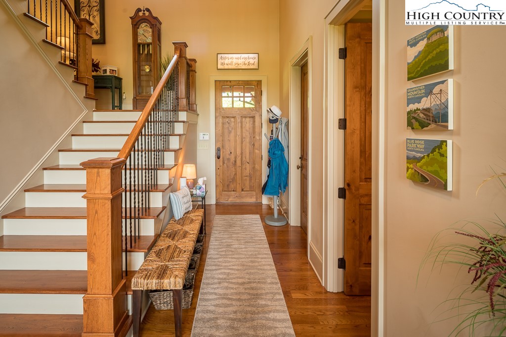 800 Turtle Creek Drive, Unit 4B Boone, NC 28607 - Photo 4 of 45 a view of a hallway with wooden floor and staircase