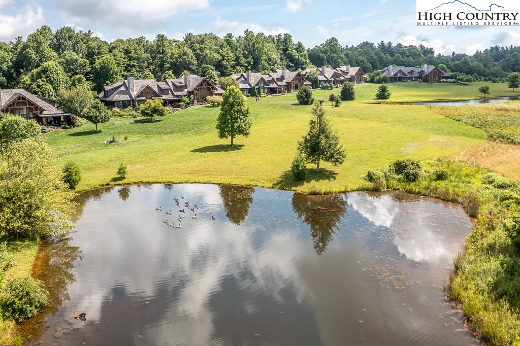 800 Turtle Creek Drive, Unit 4B Boone, NC 28607 - Photo 44 of 45 a view of a lake with a yard
