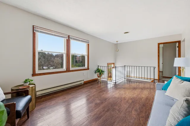 a view of livingroom with furniture and windows