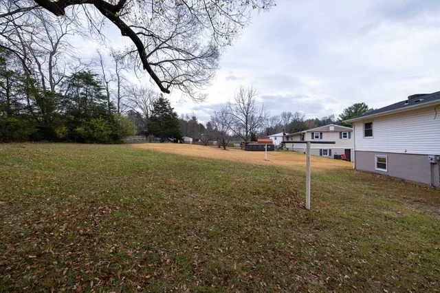 a backyard of a house with lots of green space