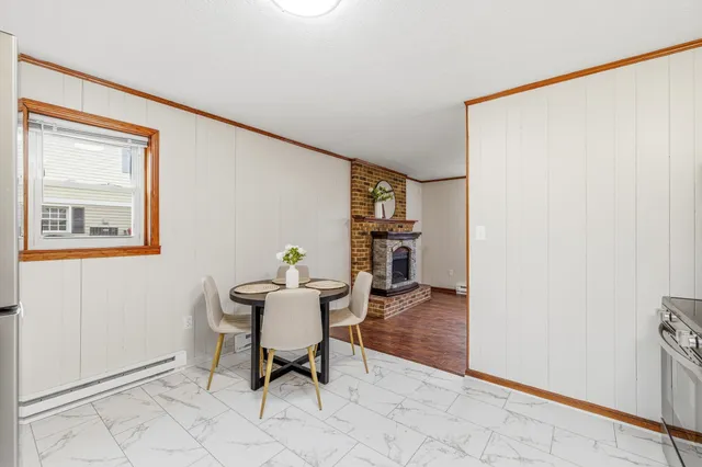 a workspace with furniture and a window