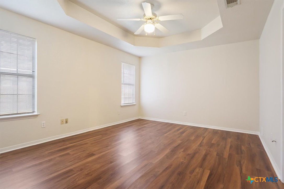 204 Rodeo Circle Copperas Cove, TX 76522 - Photo 15 of 28 wooden floor in an empty room with a window