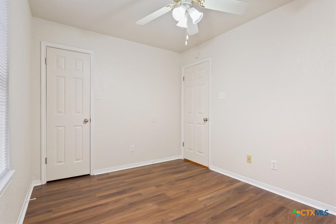 204 Rodeo Circle Copperas Cove, TX 76522 - Photo 22 of 28 a view of an empty room with wooden floor