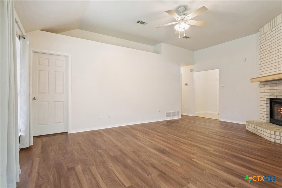 204 Rodeo Circle Copperas Cove, TX 76522 - Photo 6 of 28 a view of an empty room with a window and a ceiling fan