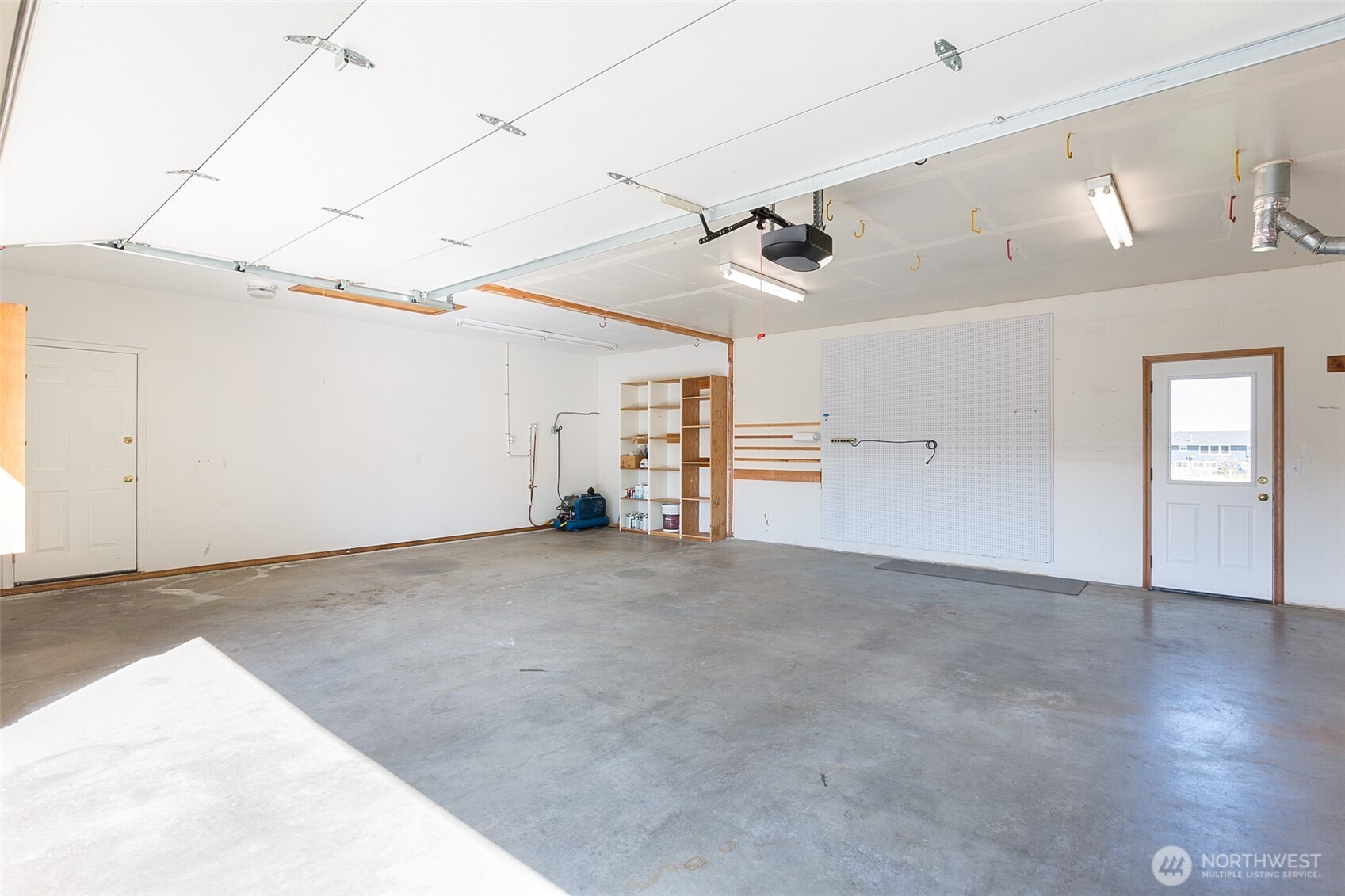 81 Bon Jon View Way Sequim, WA 98382 - Photo 35 of 38 a view of empty room with wooden floor