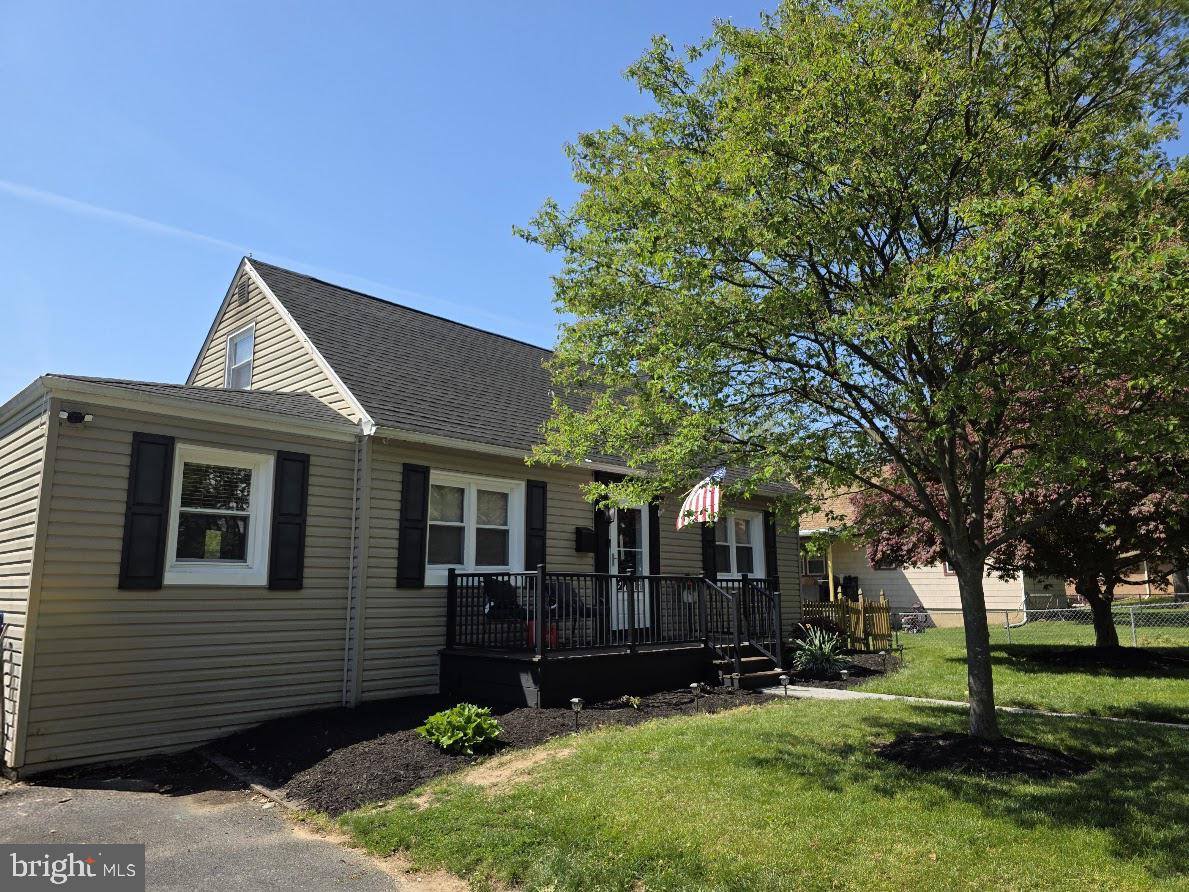 4903 Erie Road Harrisburg, PA 17111 - Photo 2 of 33 a front view of a house with a yard