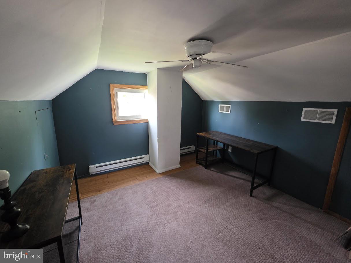 4903 Erie Road Harrisburg, PA 17111 - Photo 21 of 33 a room with furniture and a window
