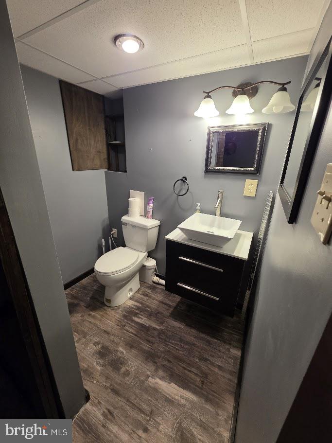 4903 Erie Road Harrisburg, PA 17111 - Photo 28 of 33 a living room with furniture a flat screen tv and a toilet