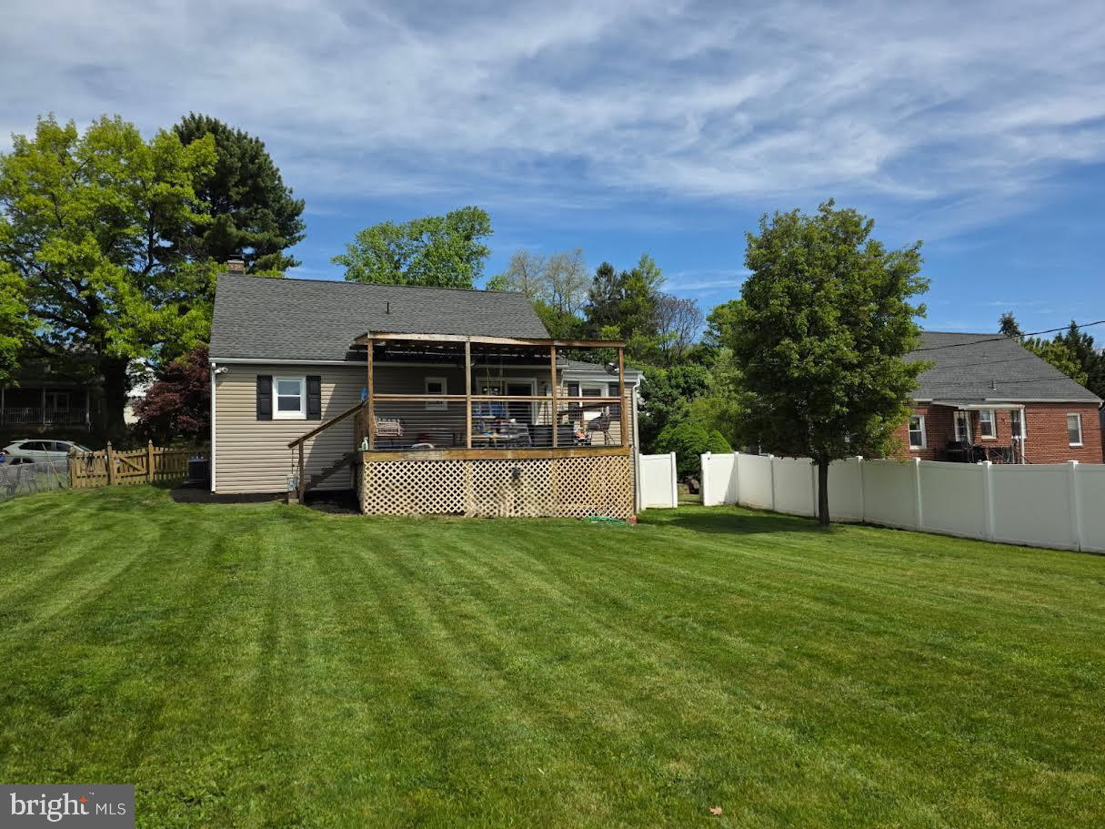 4903 Erie Road Harrisburg, PA 17111 - Photo 4 of 33 a view of a house with a yard porch and sitting area
