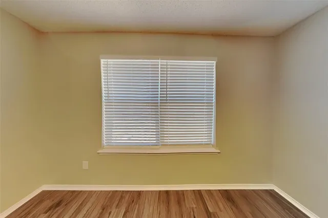 a view of a room that has a window