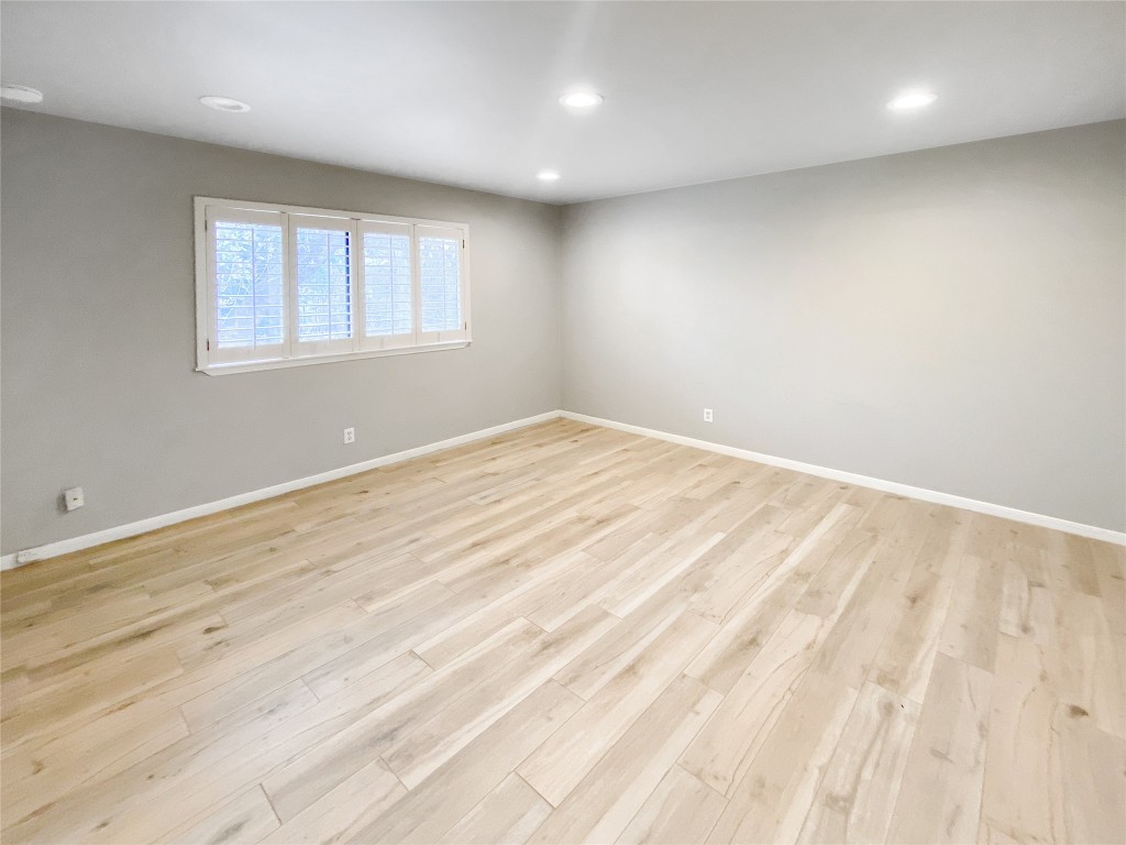 1503 Roundup Trail Round Rock, TX 78681 - Photo 15 of 23 Spare room featuring recessed lighting and light wood-style floors