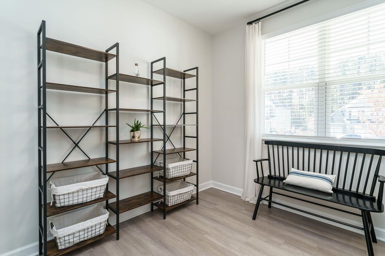 62 Maximus Circle Garner, NC 27529 - Photo 8 of 30 a view of a room with racks on the wall