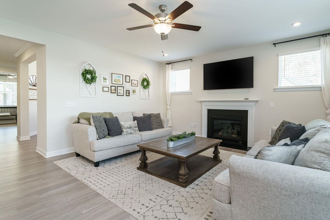 62 Maximus Circle Garner, NC 27529 - Photo 9 of 30 a living room with furniture fireplace and flat screen tv