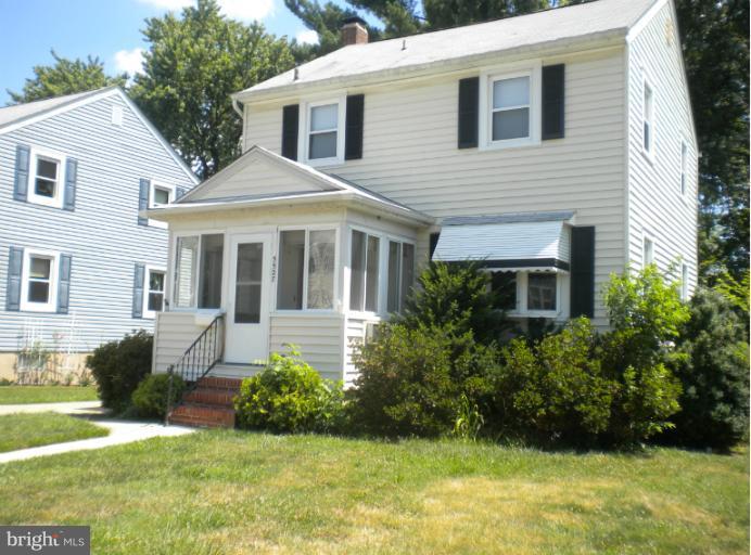 5527 Ashbourne Road Halethorpe, MD 21227 - Photo 29 of 30 a view of a house with a yard chairs and potted plants