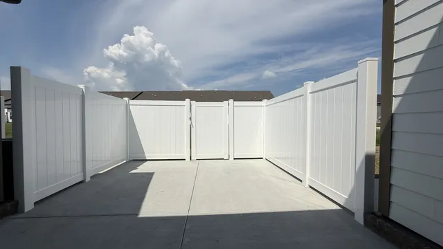 a view of an empty room with wooden door