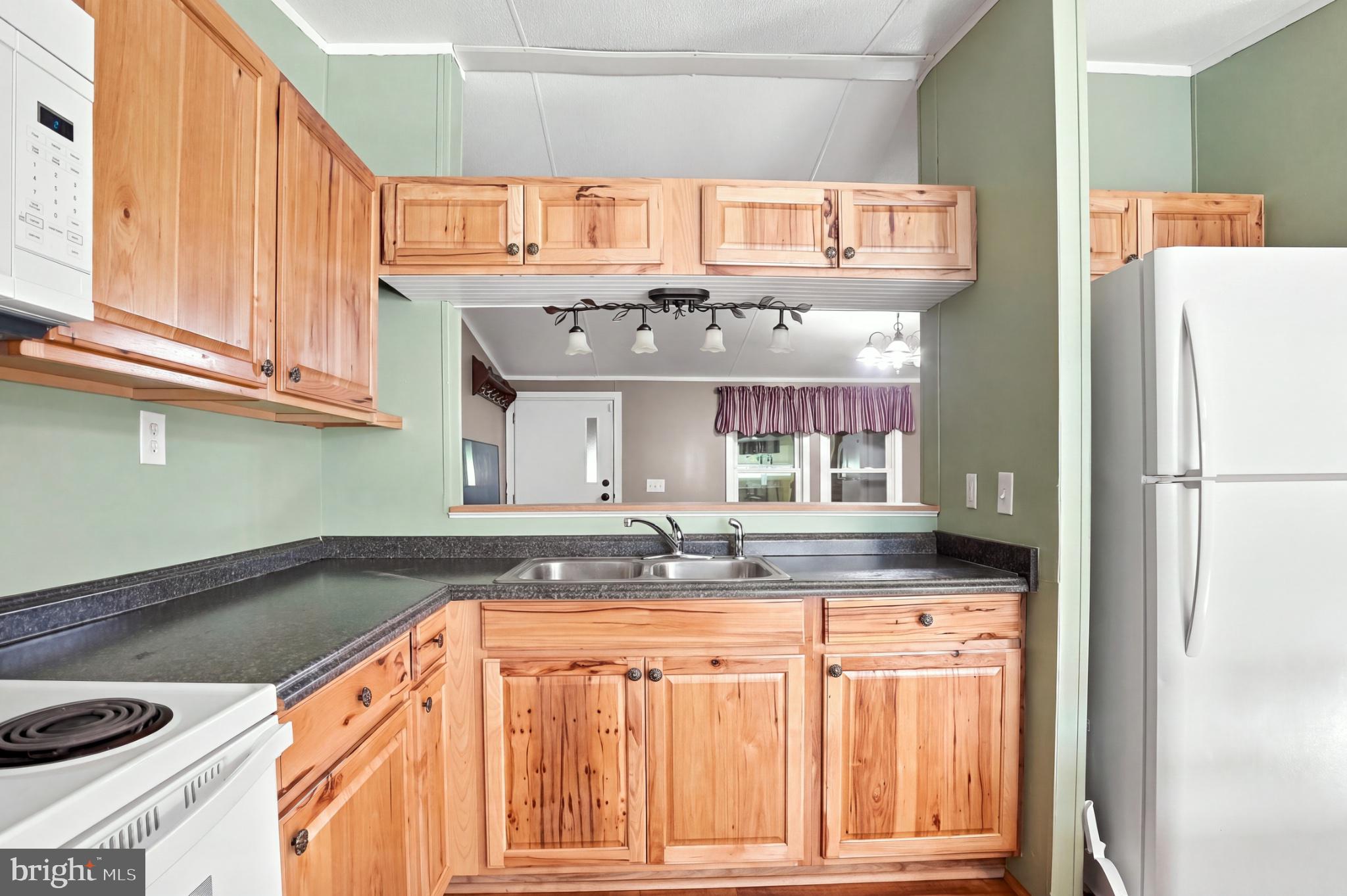 14105 Reva Road Boston, VA 22713 - Photo 13 of 38 Charming kitchen with rustic wood accents.
