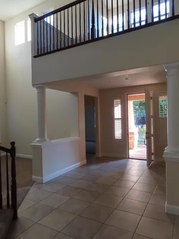 a view of a hallway with entryway