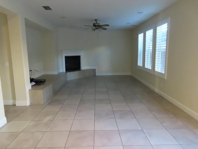 a view of a livingroom and a staircase