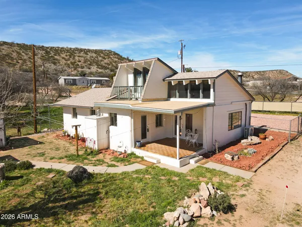 a view of a house with a park