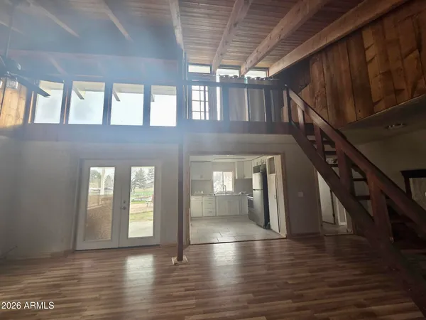 a view of livingroom with hardwood floor and window