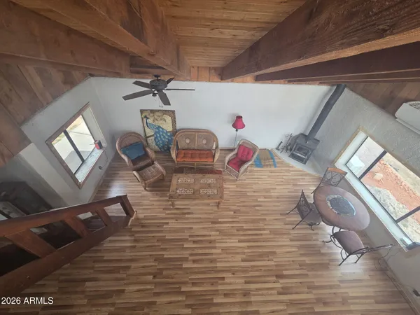a view of livingroom with furniture and ceiling fan