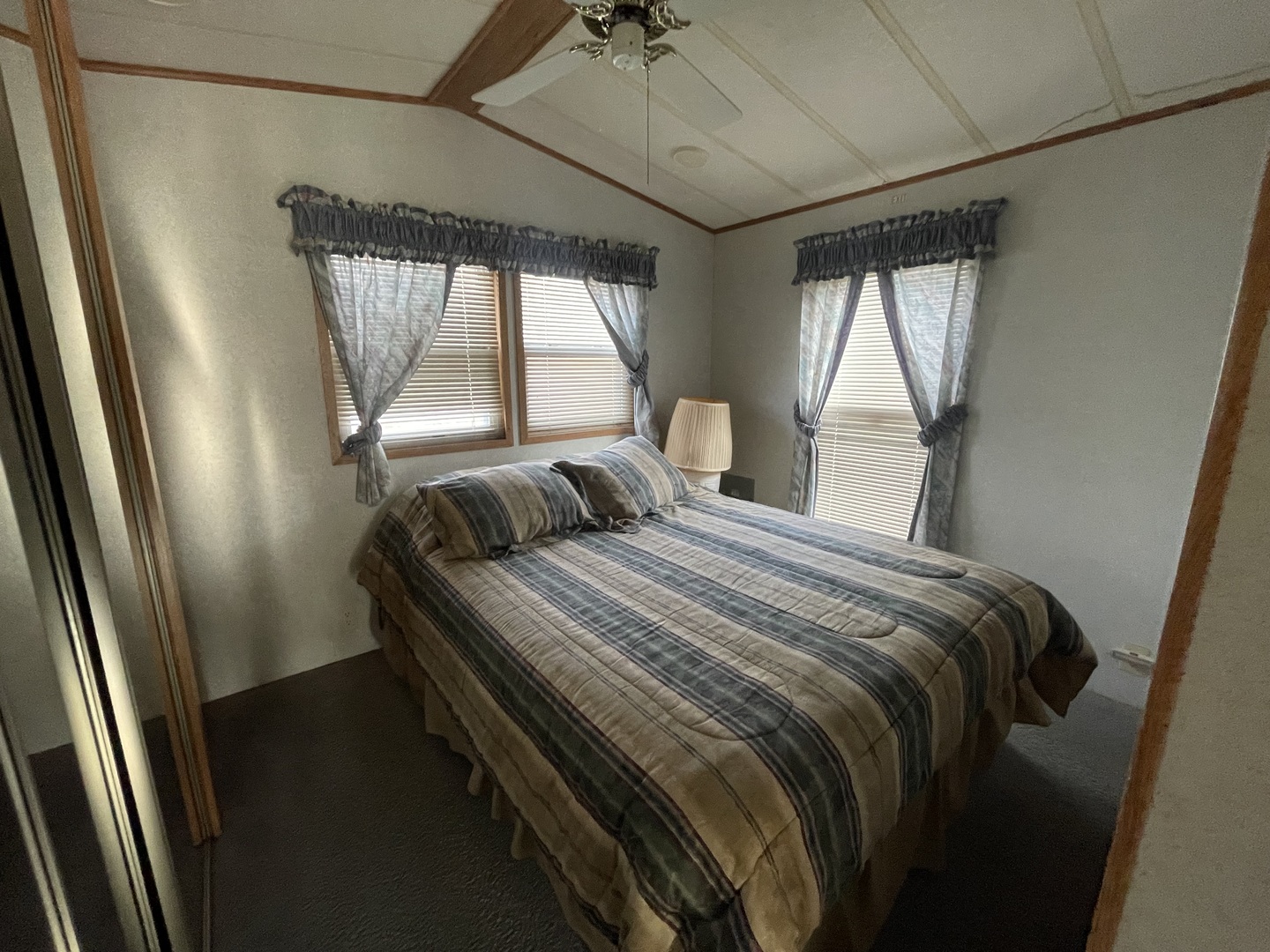 26-204 Woodhaven Lakes Sublette, IL 61367 - Photo 12 of 17 a bedroom with a bed and a window