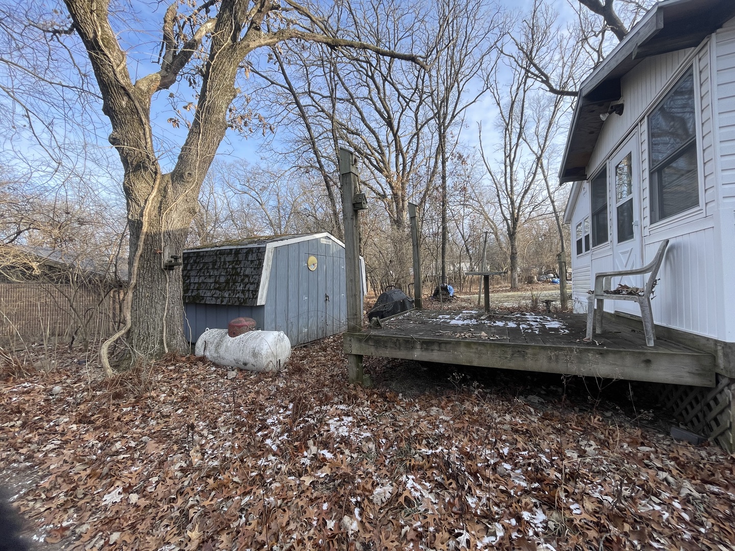 26-204 Woodhaven Lakes Sublette, IL 61367 - Photo 17 of 17 a view of a backyard with sitting area