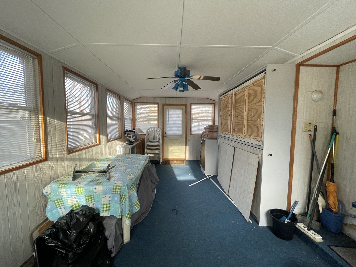 26-204 Woodhaven Lakes Sublette, IL 61367 - Photo 9 of 17 a living room with furniture and a large window