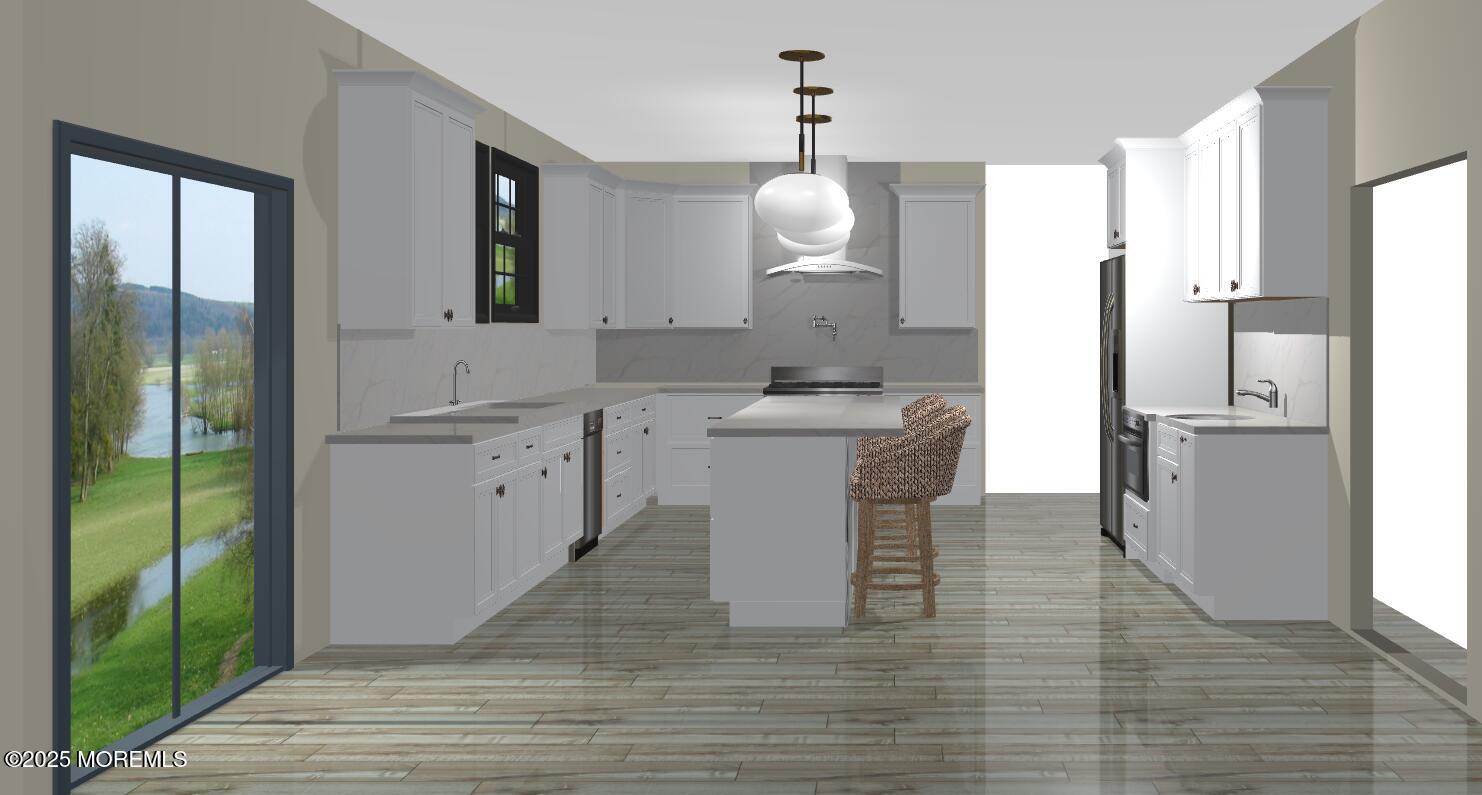 830 Holmdel Road Holmdel, NJ 07733 - Photo 3 of 7 a kitchen with a sink appliances and cabinets