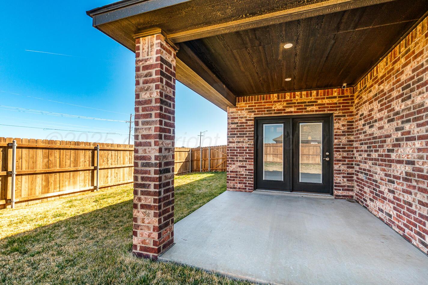 7500 Crestline Drive Amarillo, TX 79119 - Photo 23 of 24 a view of a porch with a backyard