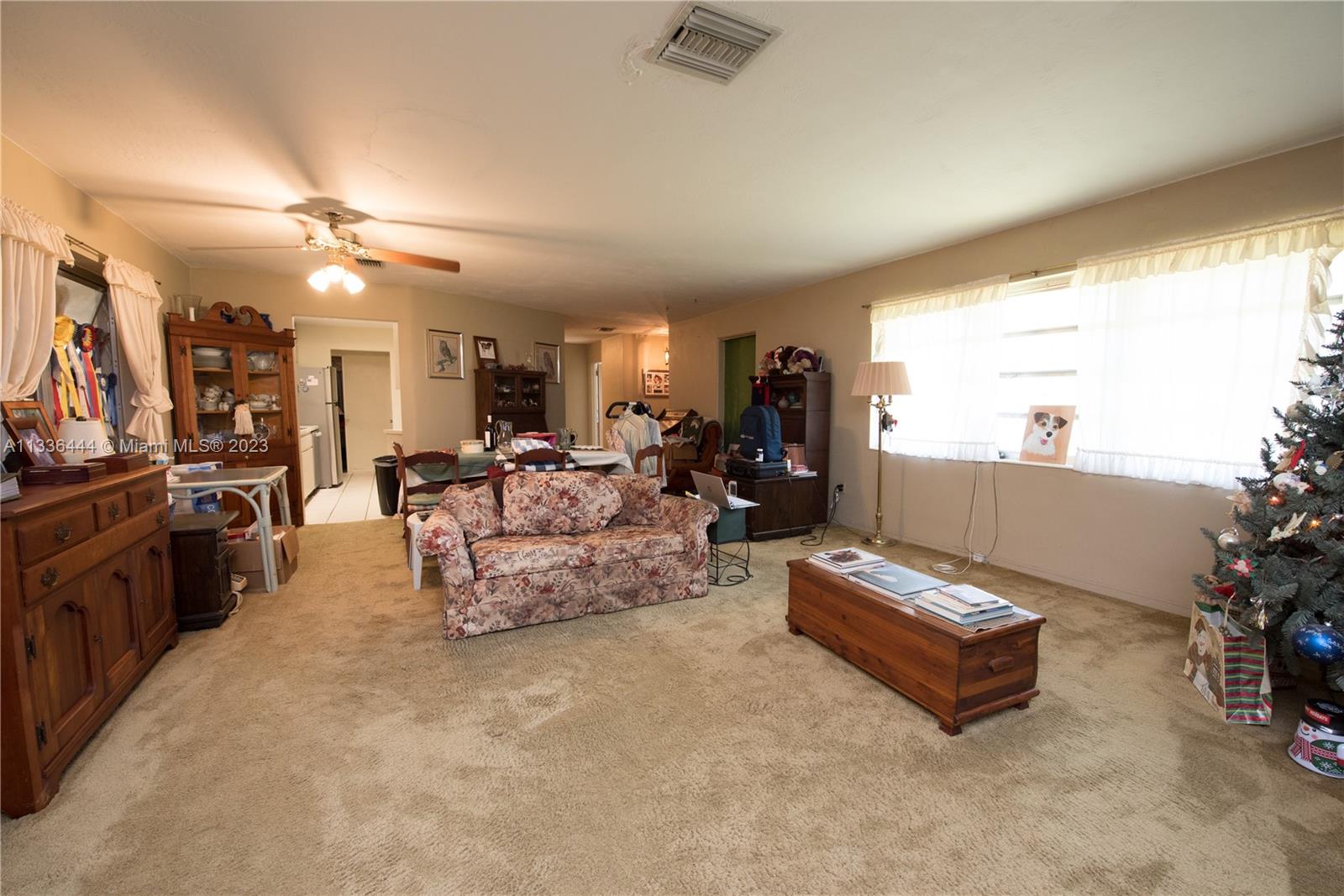Redlands Homestead, FL 33031 - Photo 15 of 35 a living room with furniture and a flat screen tv