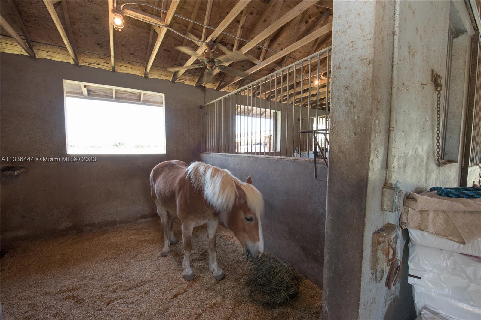 Redlands Homestead, FL 33031 - Photo 35 of 35 a view of entryway with a chandelier