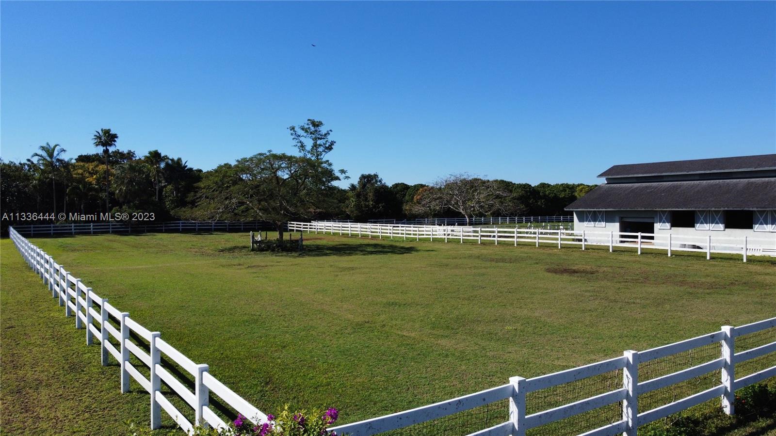 Redlands Homestead, FL 33031 - Photo 8 of 35 a view of a swimming pool with a yard