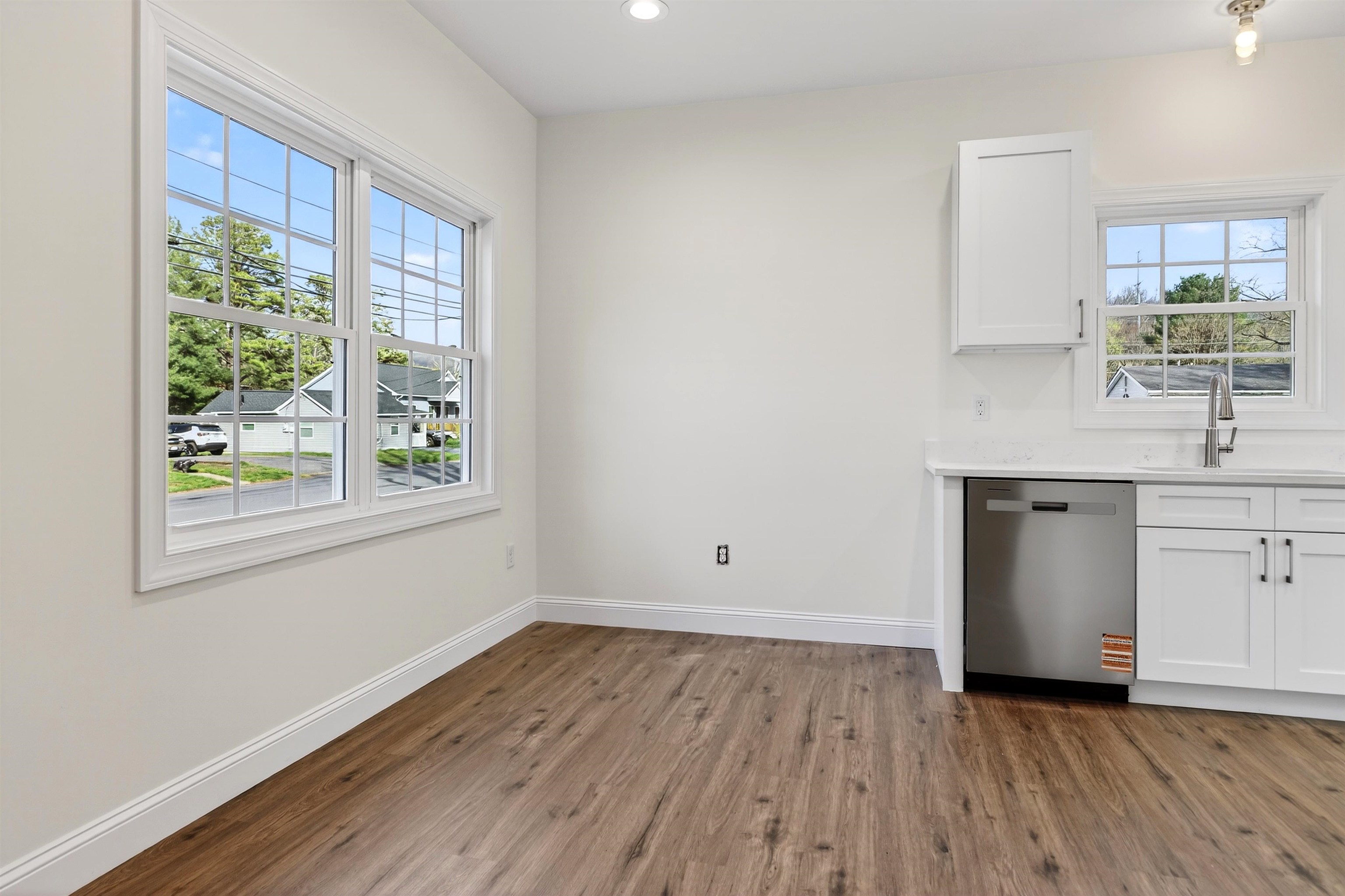 1700 A Street Waynesboro, VA 22980 - Photo 16 of 44 a view of a kitchen with wooden floor and a sink