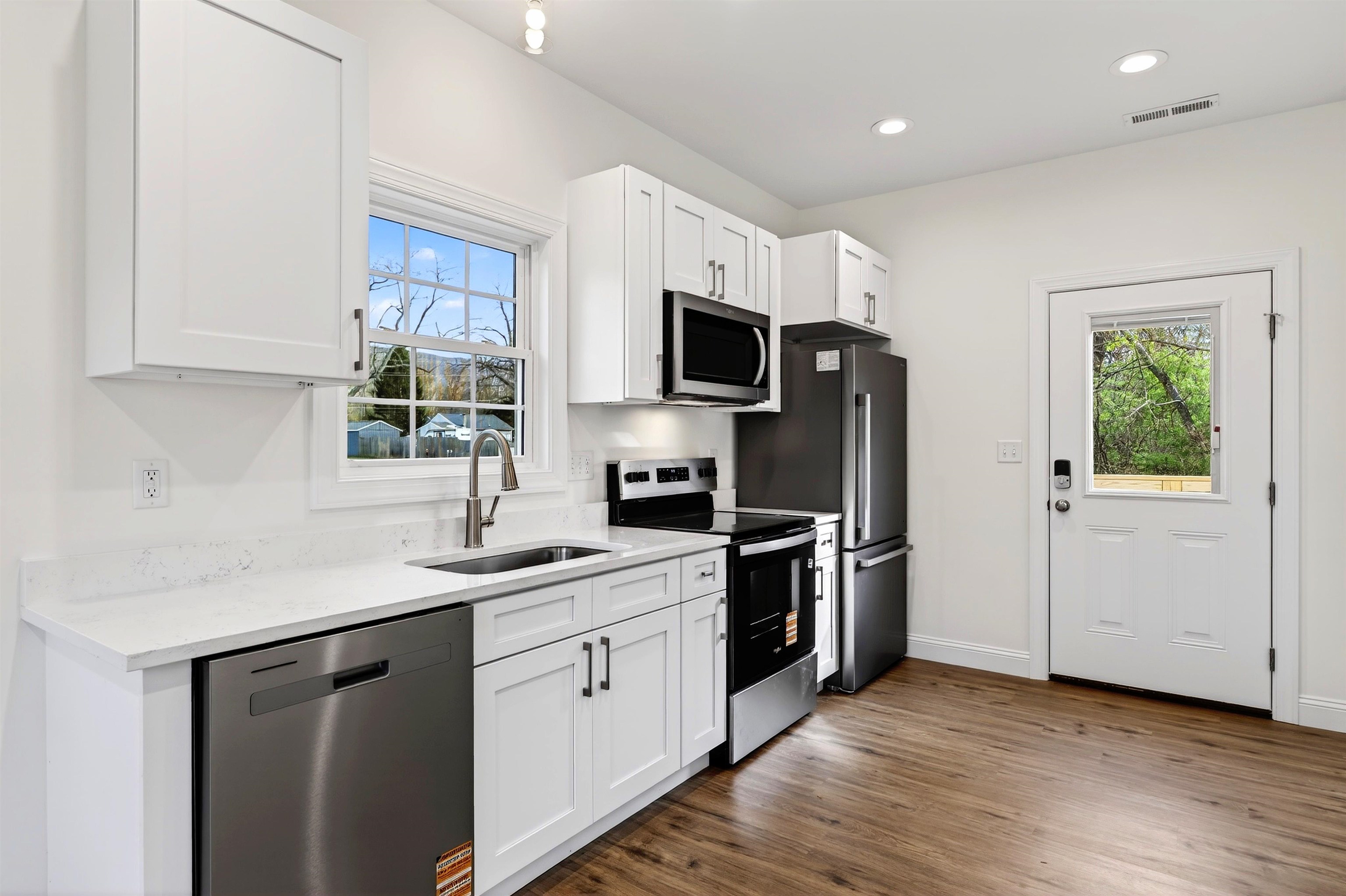 1700 A Street Waynesboro, VA 22980 - Photo 17 of 44 a kitchen with a sink cabinets and stainless steel appliances