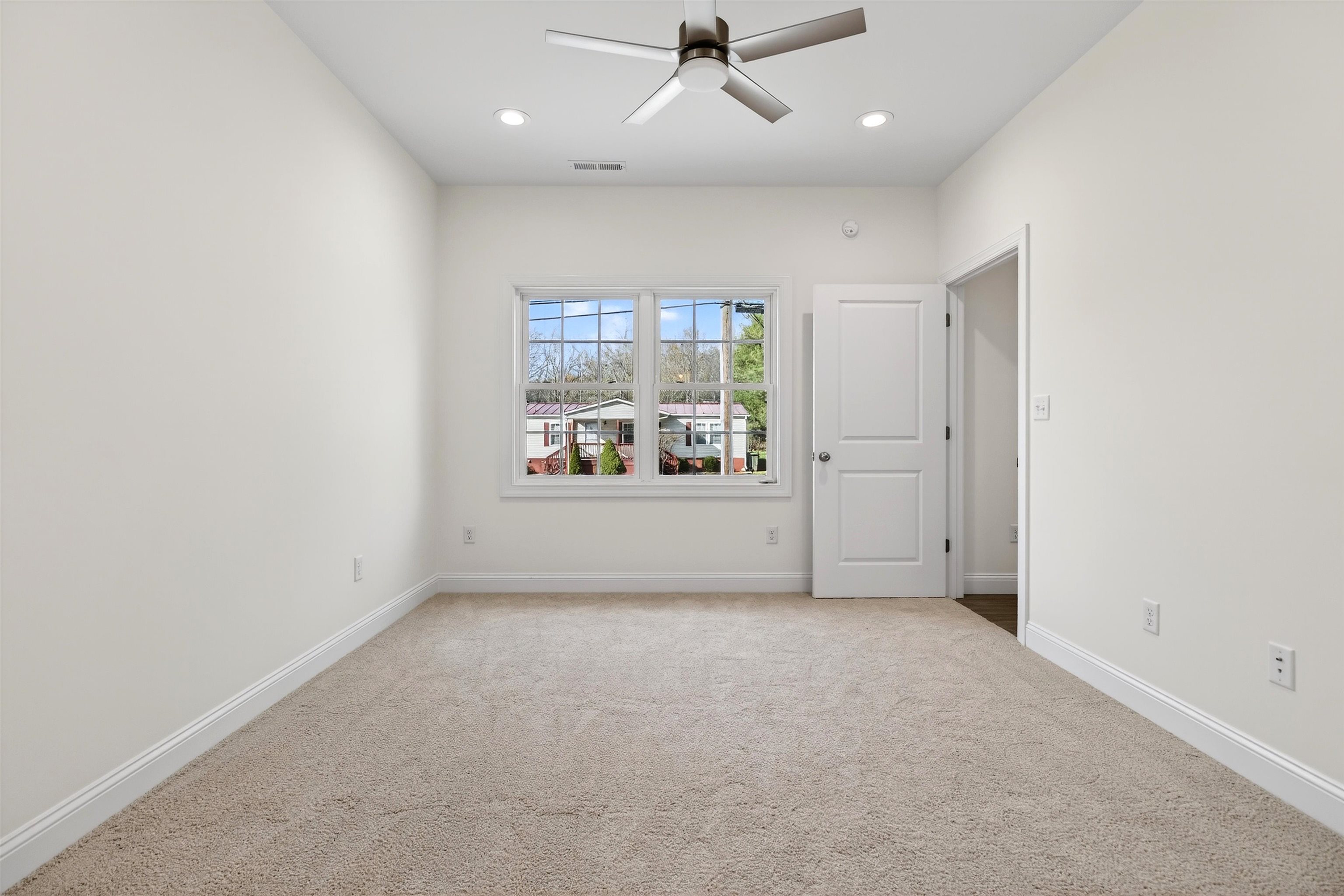 1700 A Street Waynesboro, VA 22980 - Photo 23 of 44 an empty room with windows and cabinet