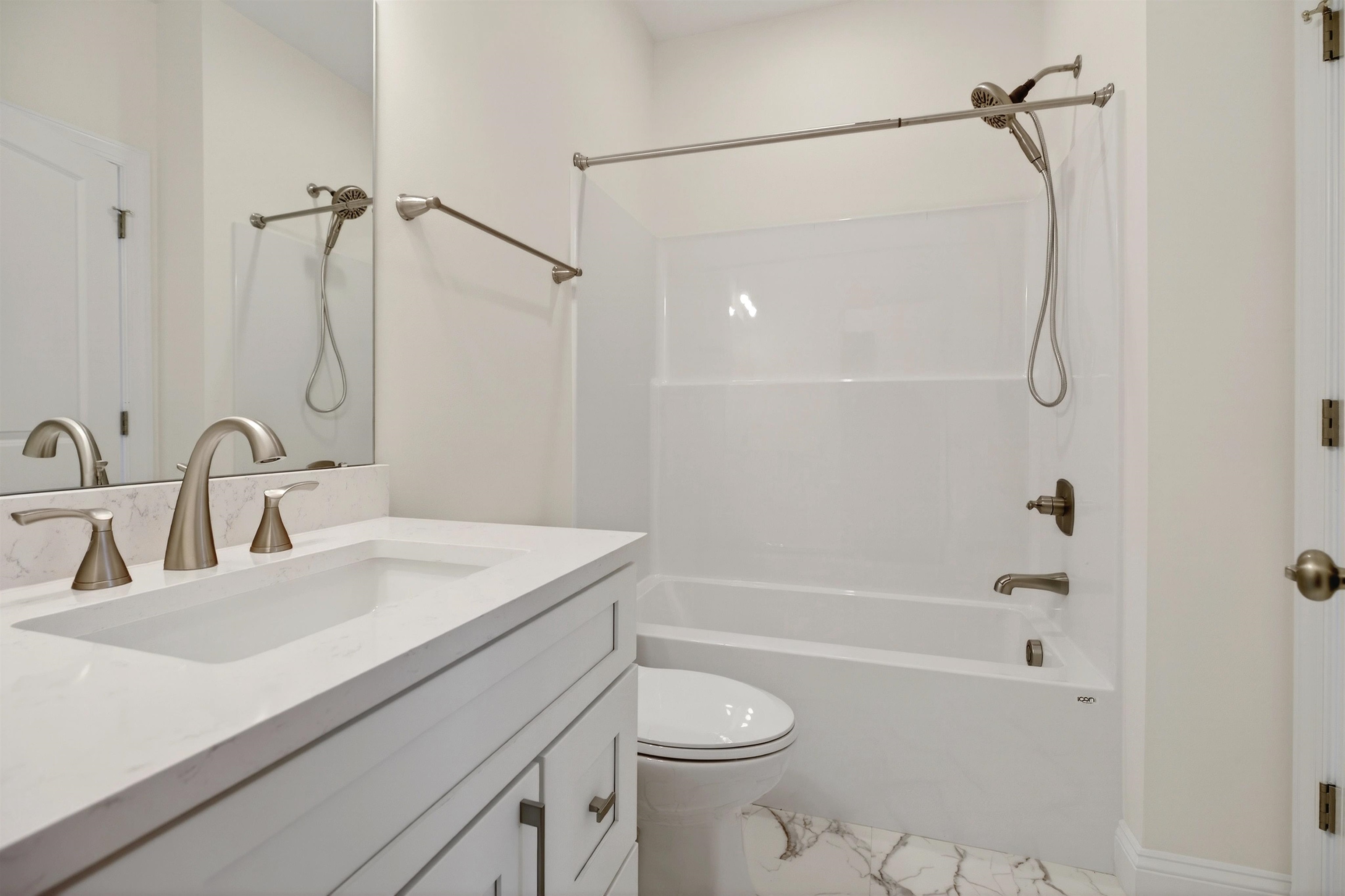 1700 A Street Waynesboro, VA 22980 - Photo 25 of 44 a bathroom with a granite countertop sink a toilet and shower