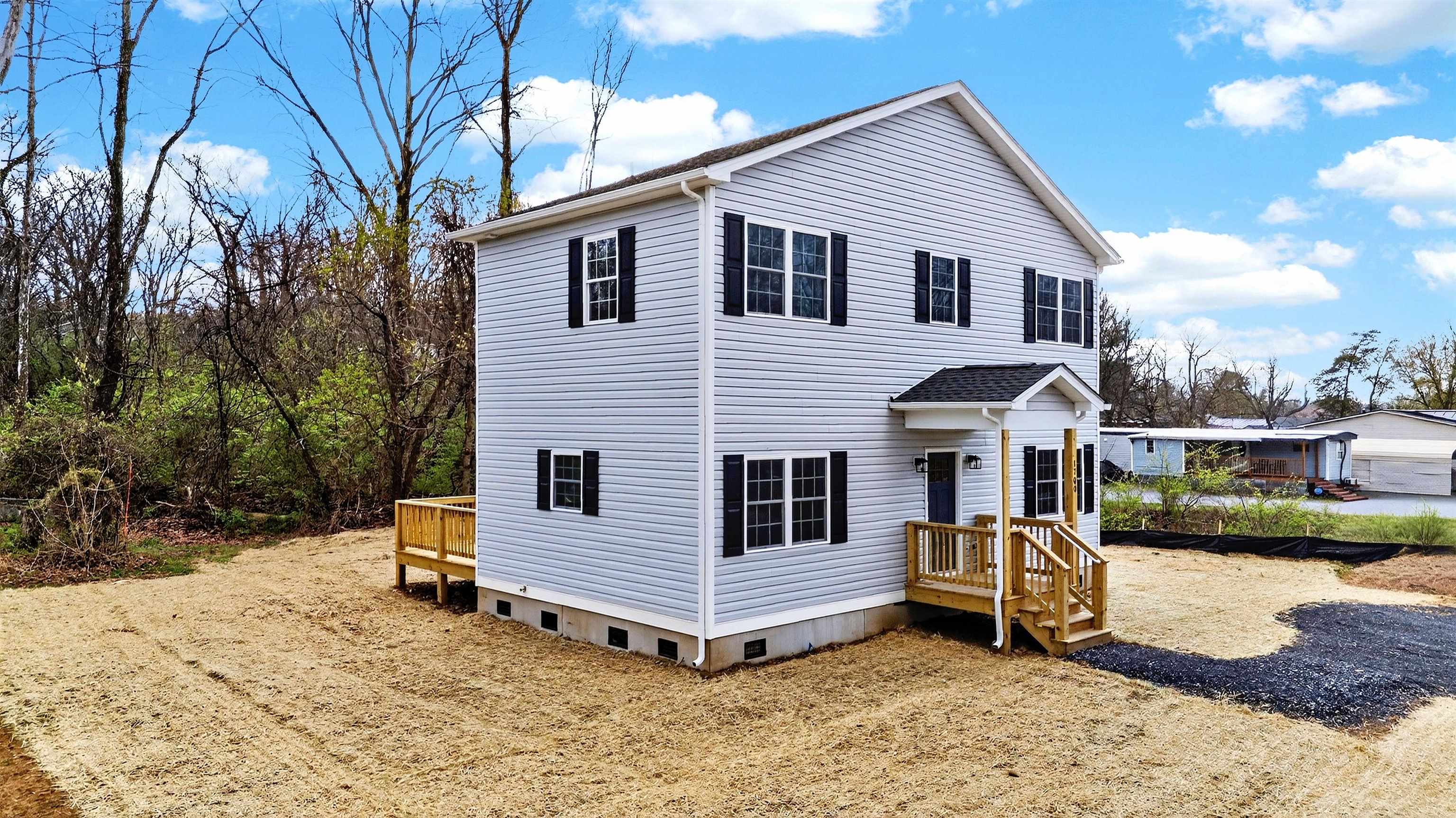 1700 A Street Waynesboro, VA 22980 - Photo 39 of 44 a view of a house with a yard and wooden fence