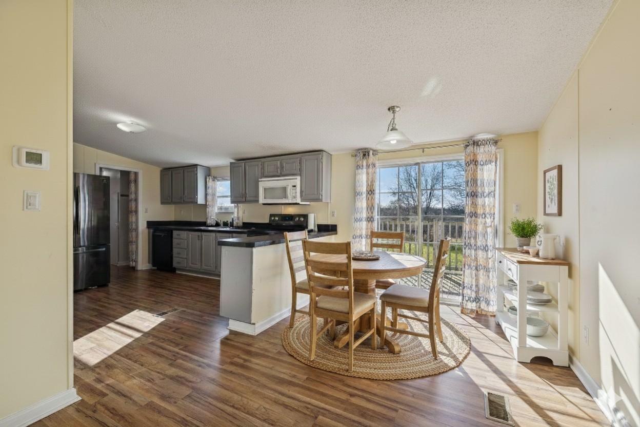 217 Tomlinson Road Lebanon, TN 37087 - Photo 6 of 23 a view of a dining room with furniture window and wooden floor