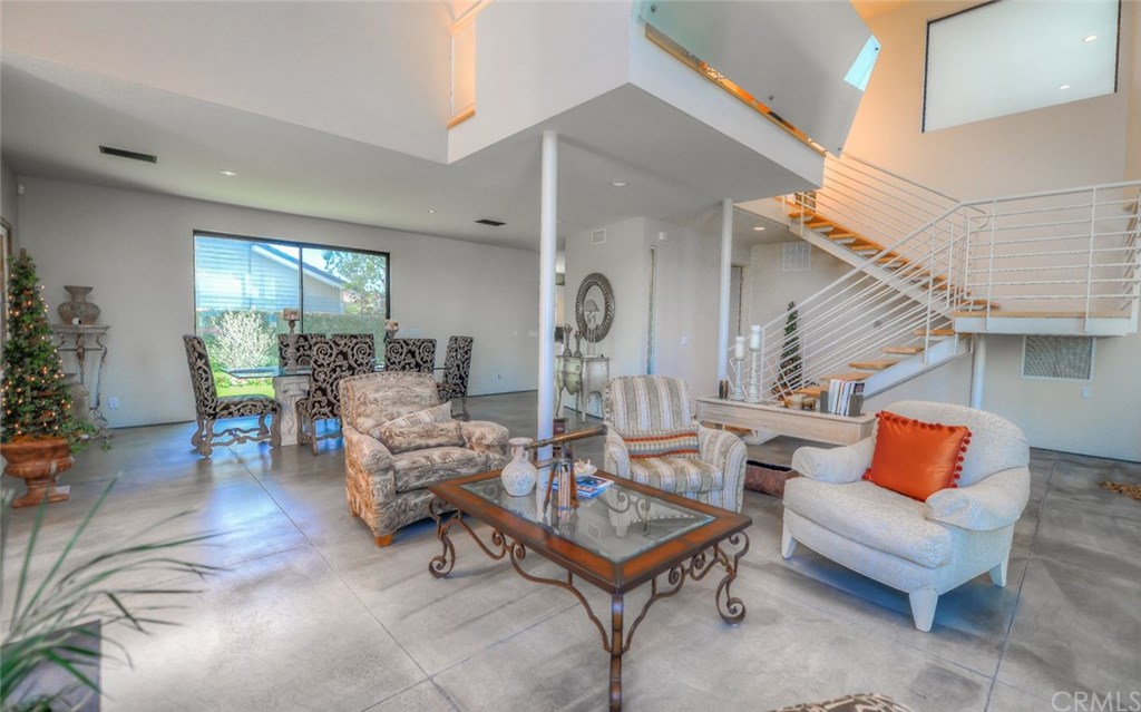 2831 Ridge Drive Laguna Beach, CA 92651 - Photo 13 of 49 a living room with furniture a rug and a window