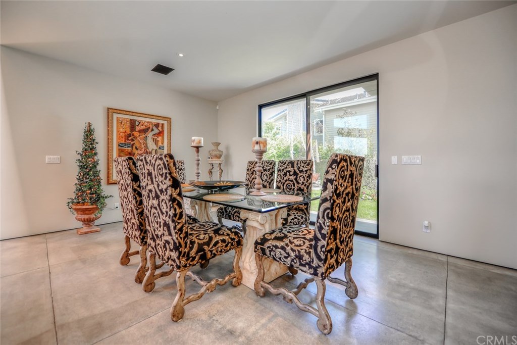 2831 Ridge Drive Laguna Beach, CA 92651 - Photo 14 of 49 a view of a dining room with furniture and chandelier