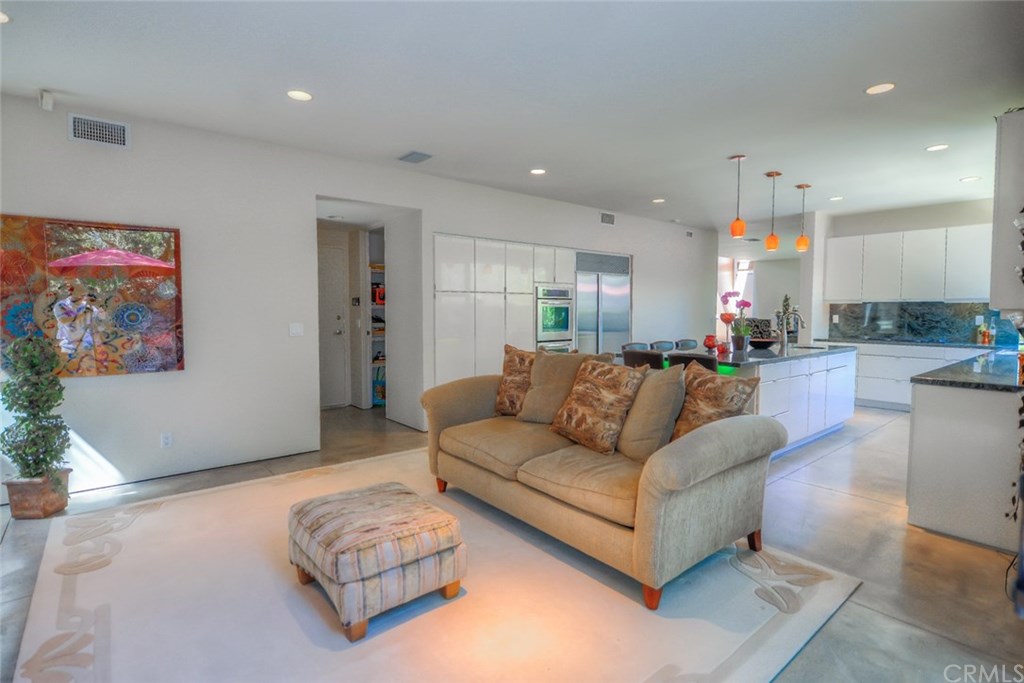 2831 Ridge Drive Laguna Beach, CA 92651 - Photo 24 of 49 a living room with furniture and a potted plant