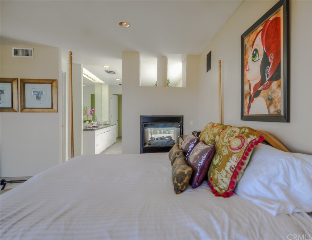 2831 Ridge Drive Laguna Beach, CA 92651 - Photo 37 of 49 a living room with furniture and a fireplace