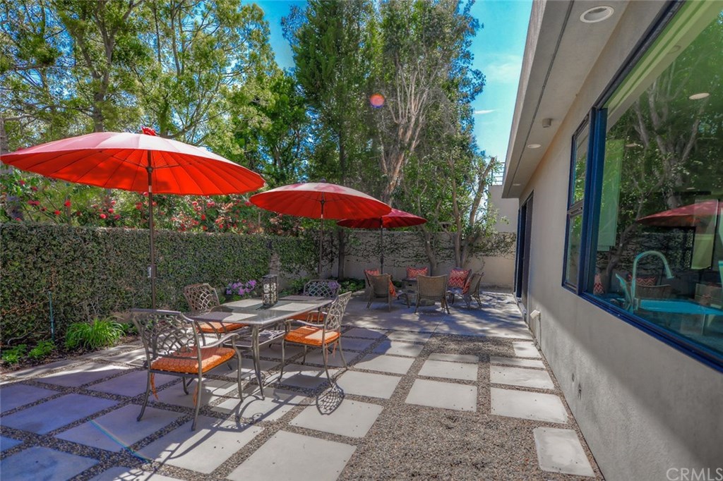 2831 Ridge Drive Laguna Beach, CA 92651 - Photo 45 of 49 an outdoor space with furniture and umbrella